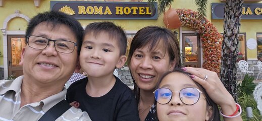 Smiling family spending time together outdoors